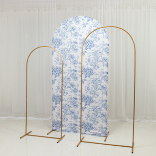Floral backdrop with two gold arch stands for photography setup.