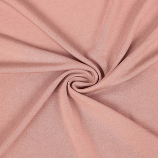 Soft pink fabric texture close-up for apparel and crafting projects.