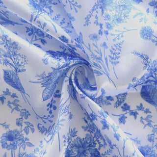 Blue floral patterned fabric with intricate designs.
