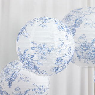 Blue floral paper lanterns hanging in a bright setting.