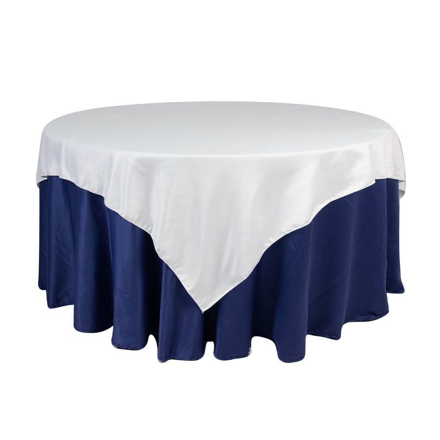 Round table with white and navy blue tablecloth