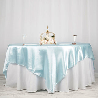 Add a Touch of Elegance with the Light Blue Satin Square Table Overlay