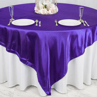 Create a Stunning Purple Decor with a Satin Table Overlay