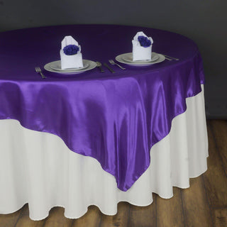 Add Elegance to Your Event with a Purple Satin Table Overlay