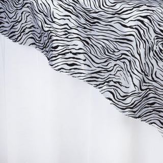 Create a Memorable Event with the 90"x90" Black and White Tiger Print Taffeta Square Table Overlay