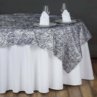 Elevate Your Jungle Theme Party with the 90"x90" Black and White Tiger Print Taffeta Square Table Overlay
