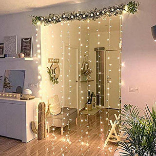 Create a Magical Ambiance with 10ft Warm White 300 LED Icicle Curtain Fairy String Lights