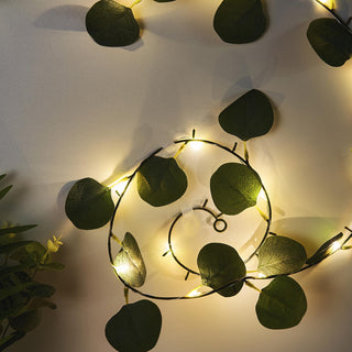 Add a Touch of Radiant Greenery with 7ft 20 LED Green Silk Eucalyptus Leaf Garland Vine String Lights