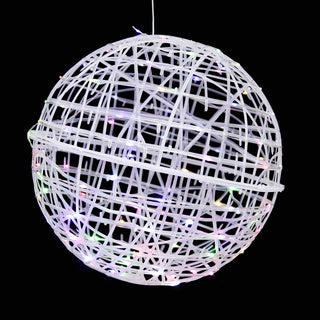 Illuminated decorative globe with colorful lights on a black background. #whtbkgd