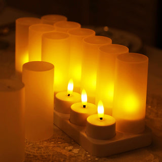 Set of glowing LED candles in various sizes, creating a warm ambiance.