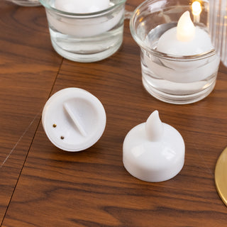 Battery-operated white tea light candle with removable top.