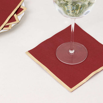 50 Pack Burgundy Soft 2 Ply Disposable Cocktail Napkins with Gold Foil Edge, Paper Beverage Napkins - 6.5"x6.5"