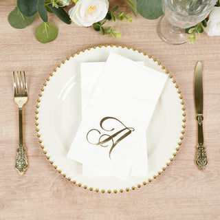 Elegant table setting with gold-accented plate, napkin, and cutlery.