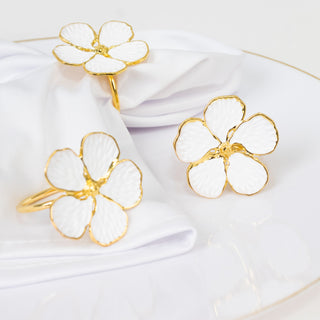 Add Style and Sparkle to Your Table with White and Gold Metal Flower Napkin Rings Add Style and Sparkle to Your Table with White and Gold Metal Flower Napkin Rings
