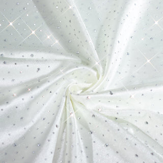 Sparkling white fabric with silver embellishments for elegant designs. #whtbkgd