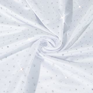 White fabric with shiny rhinestones, twisted in a spiral pattern. #whtbkgd