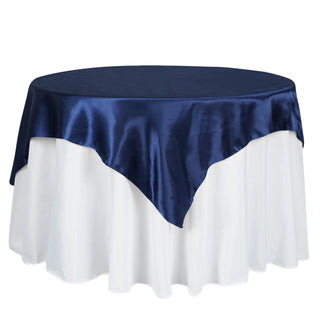 Add Elegance to Your Event with the Navy Blue Square Smooth Satin Table Overlay