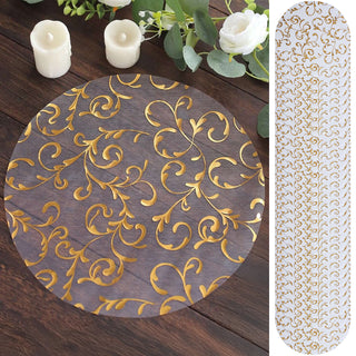Gold floral design table runner on wood surface.