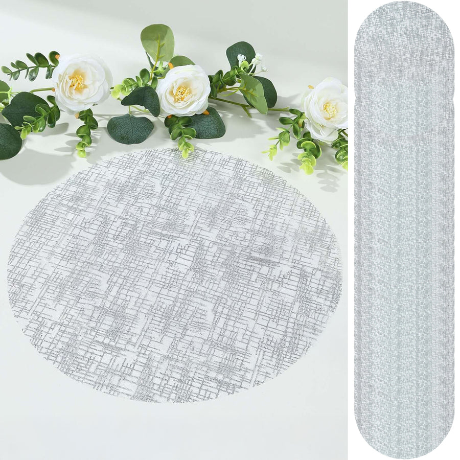 Round textured placemat in gray with floral accents.