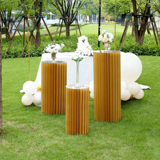 Elevate Your Event Decor with the Gold Cylinder Display Column Stand Elevate Your Event Decor with the Gold Cylinder Display Column Stand