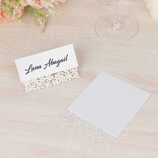 Elegant White Wedding Table Number Cards with Laser Cut Leaf Vine Design Elegant White Wedding Table Number Cards with Laser Cut Leaf Vine Design