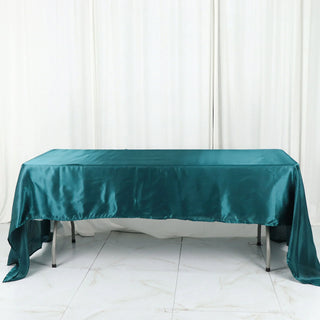 Add Elegance to Your Event with the 60"x126" Peacock Teal Seamless Satin Rectangular Tablecloth