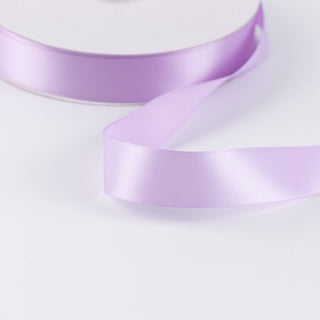 Light lavender satin ribbon on a white background