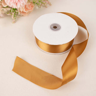 Unleash Your Creativity with 1.5" Gold Satin Ribbon Unleash Your Creativity with 1.5" Gold Satin Ribbon