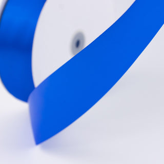Abstract blue ribbon on white background close-up