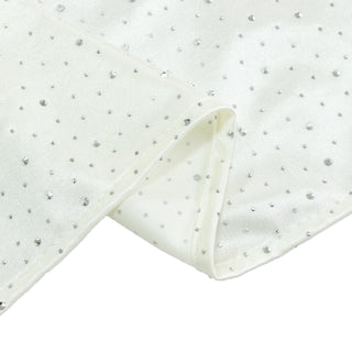 White fabric with silver sequins detail