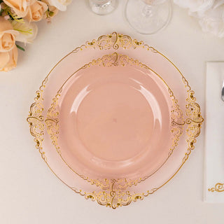 Elegant pink plate with gold filigree design, perfect for dining.