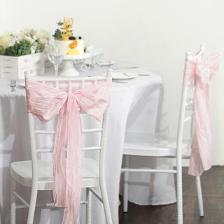 Elevate Your Event Decor with Blush Accordion Crinkle Taffeta Chair Sashes Elevate Your Event Decor with Blush Accordion Crinkle Taffeta Chair Sashes