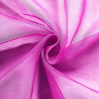 Sheer pink fabric with a smooth, flowing texture. #whtbkgd