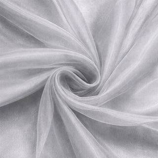 Sheer gray fabric texture with a soft, flowing appearance. #whtbkgd