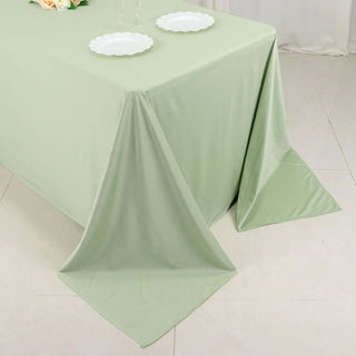 Experience Luxury and Convenience with the Sage Green Scuba Rectangular Tablecloth Experience Luxury and Convenience with the Sage Green Scuba Rectangular Tablecloth