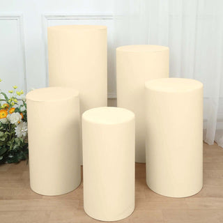 Upgrade Your Event with Beige Cylinder Stretch Fitted Pedestal Pillar Prop Covers Upgrade Your Event with Beige Cylinder Stretch Fitted Pedestal Pillar Prop Covers