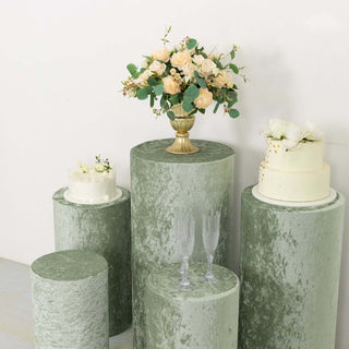 Event Decor With Sage Green Velvet Cylinder Plinth Covers Event Decor With Sage Green Velvet Cylinder Plinth Covers