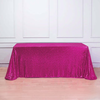 Pink sequin tablecloth draped elegantly over a table.