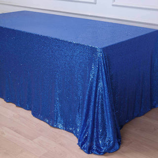 Blue sequin tablecloth draped elegantly over a table.