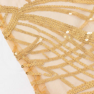 Gold sequin fabric with intricate patterns and textures.