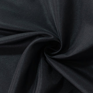 Black stretch fabric with smooth texture and subtle sheen. #whtbkgd