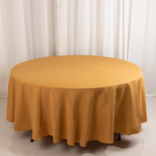 <strong>Beautiful Gold Premium Polyester Round Tablecloth</strong> <strong>Beautiful Gold Premium Polyester Round Tablecloth</strong>