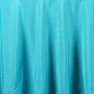 Unleash Your Creativity with the 108" Turquoise Polyester Round Tablecloth Unleash Your Creativity with the 108" Turquoise Polyester Round Tablecloth