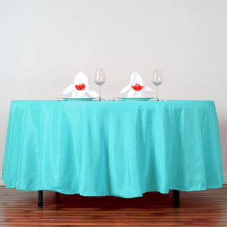 Elevate Your Event Decor with the 108" Turquoise Polyester Round Tablecloth Elevate Your Event Decor with the 108" Turquoise Polyester Round Tablecloth