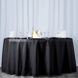Elevate Your Event with the 120" Black Seamless Premium Polyester Round Tablecloth Elevate Your Event with the 120" Black Seamless Premium Polyester Round Tablecloth