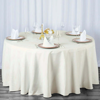 Elevate Your Event with the Elegant Ivory Polyester Round Tablecloth Elevate Your Event with the Elegant Ivory Polyester Round Tablecloth