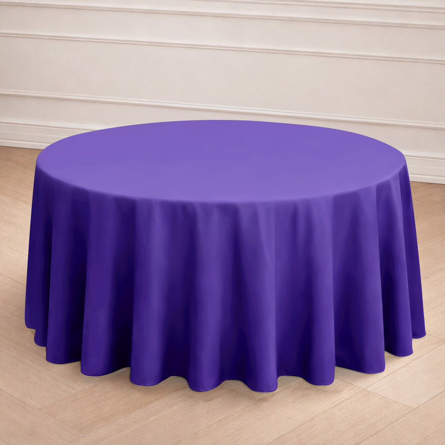 Purple round tablecloth draping elegantly over a table.