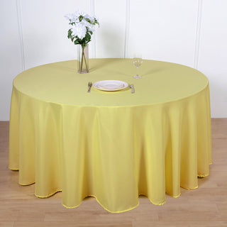 Add Elegance to Your Event with a 120" Yellow Seamless Polyester Round Tablecloth Add Elegance to Your Event with a 120" Yellow Seamless Polyester Round Tablecloth