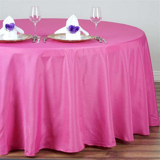 Add Elegance to Your Events with the 132" Fuchsia Seamless Polyester Round Tablecloth Add Elegance to Your Events with the 132" Fuchsia Seamless Polyester Round Tablecloth