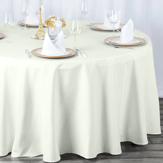 Elevate Your Event with the 132" Ivory Seamless Premium Polyester Round Tablecloth